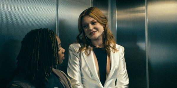 Ashley (Colby Minifie) and Sister Sage (Susan Heyward) smile sarcastically at each other in The Boys season 4 episode 2