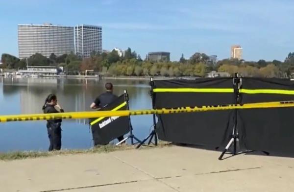 Volunteers spotted a suitcase floating in Lake Merritt on Tuesday morning and made the grisly discovery