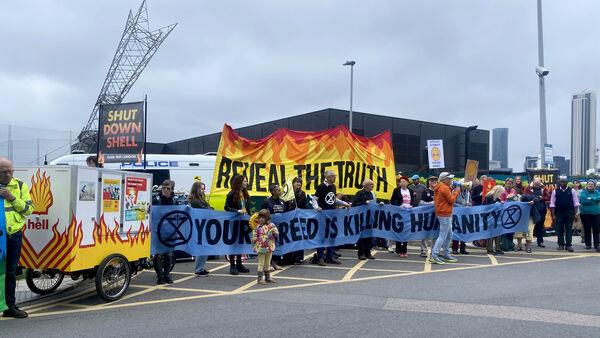 Shell shareholders vote down resolution from climate activist group