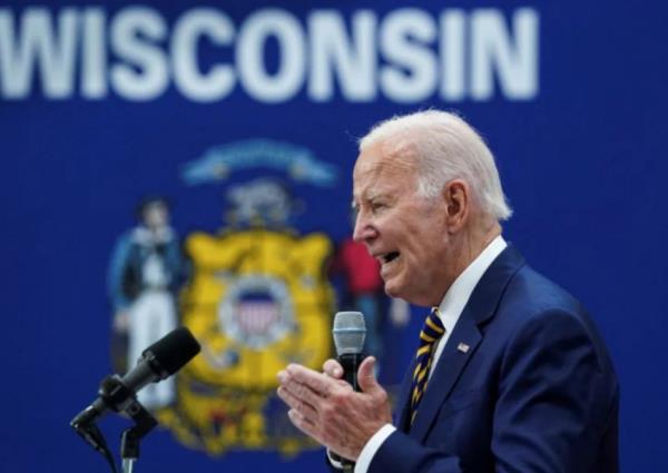 Biden attacks Trump's anti-immigrant 'blood' comments in Wisco<em></em>nsin visit