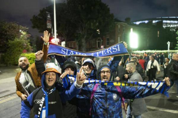 Fans leave after the Europa League Final at the Aviva stadium