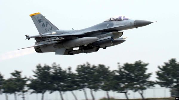 FILE - U.S. Air Force's F-16 fighter takes off during an exercise at Kunsan Air ba<em></em>se in Gunsan, South Korea on April 20, 2017. A U.S. Air Force pilot safely ejected on Dec. 11, 2023, before his F-16 crashed into the sea off South Korea’s southwestern coast. 
