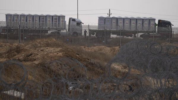 Egypt says it will send aid trucks into Gaza through Kerem Shalom crossing